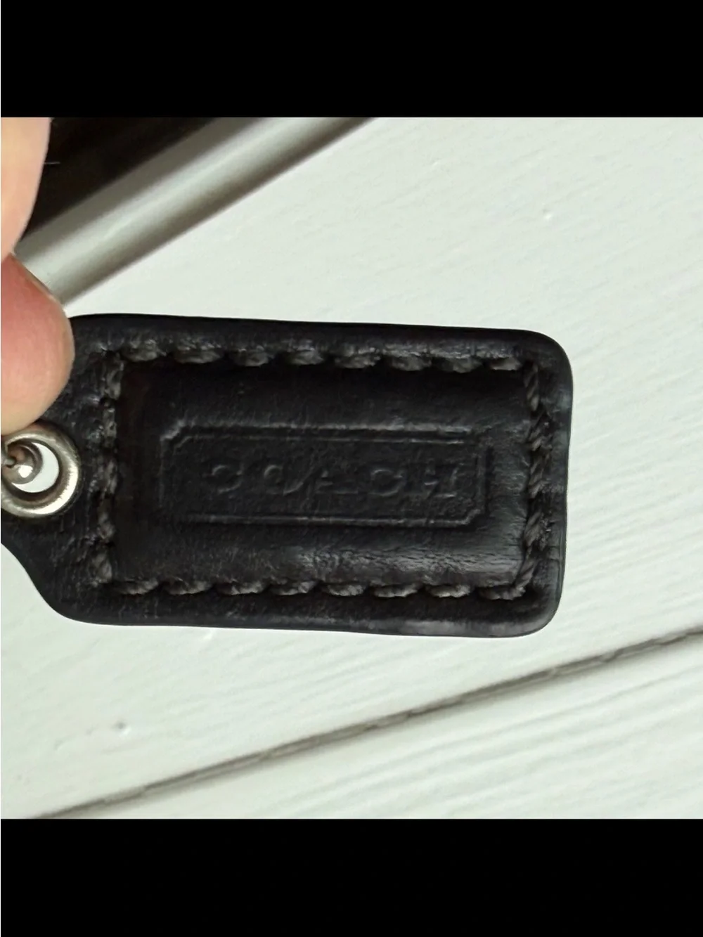 Coach, Soho, wristlet Black Leather Wristlet with Buckle Detail excellent condi